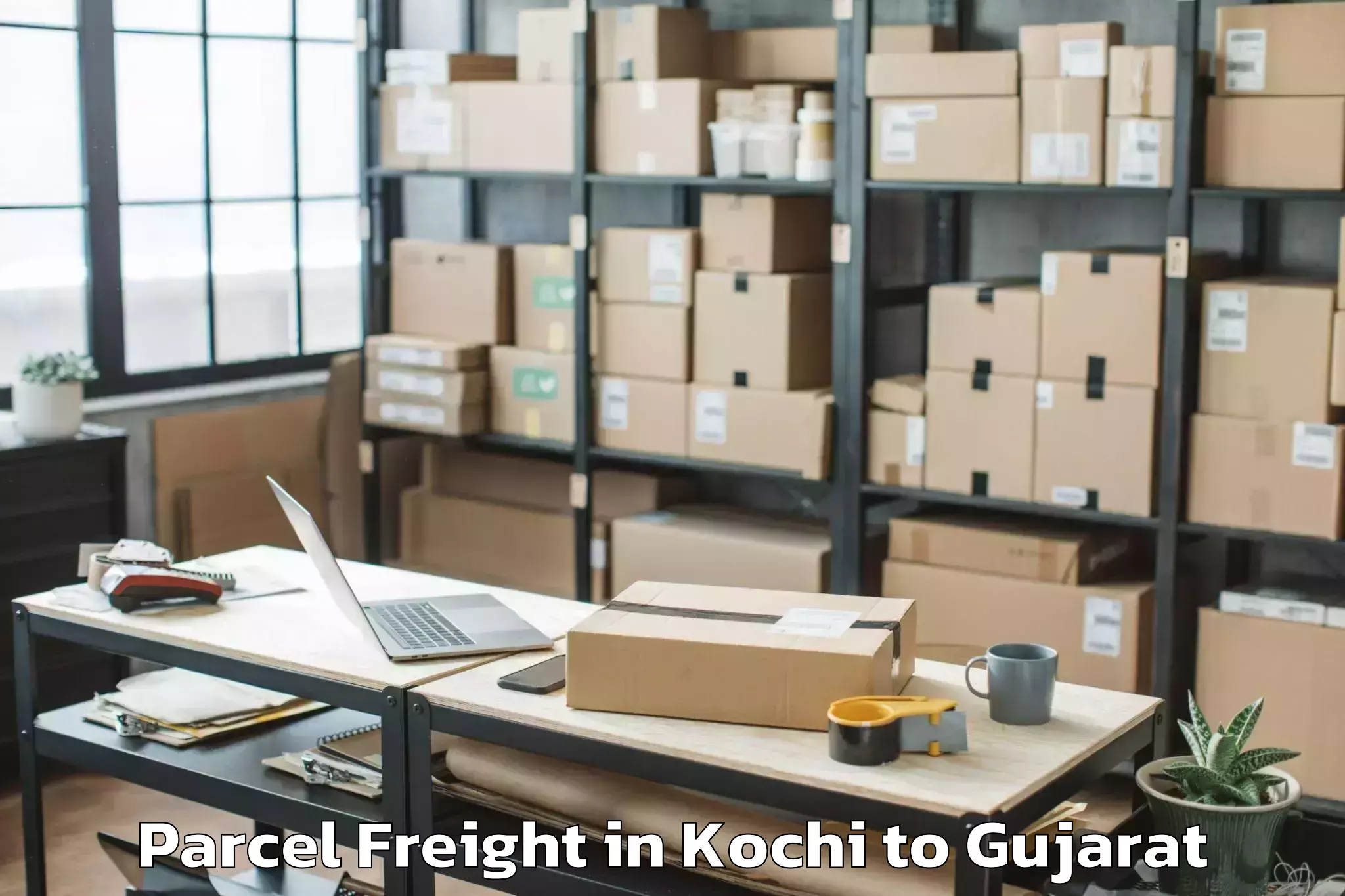 Book Kochi to Jhagadia Parcel Freight Online